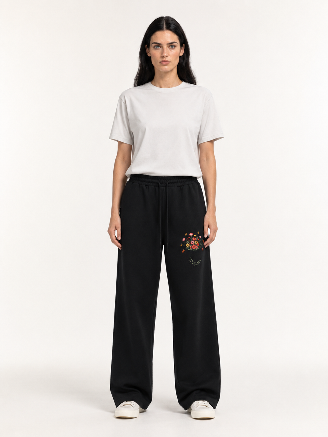 Wildflower Print Straight-Leg Cotton Sweatpants, worn by a model.