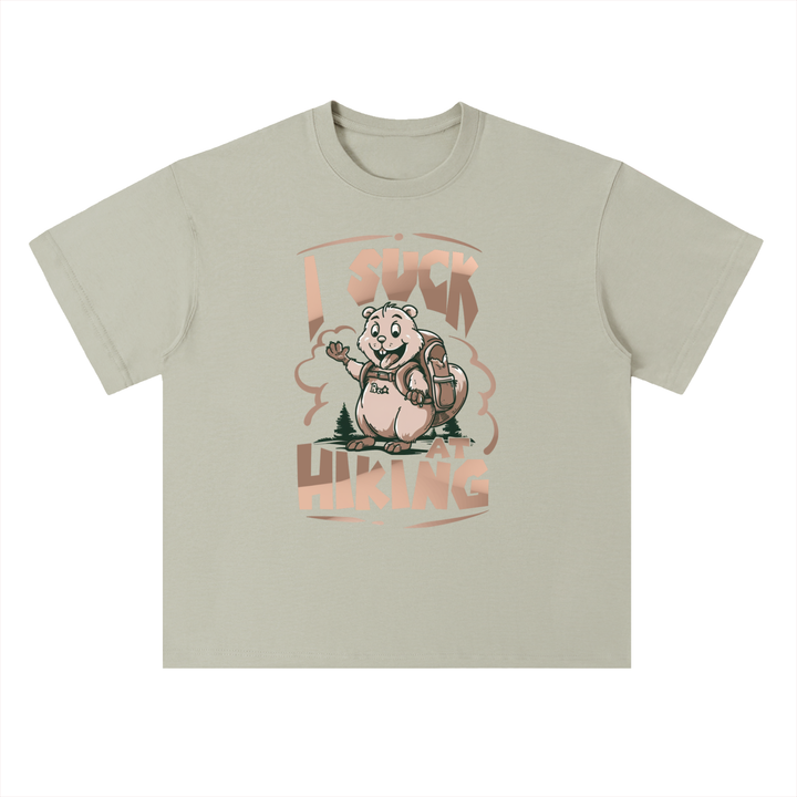 I Suck At Hiking Funny Cartoon Bear Tee in Gray Green, flat lay.