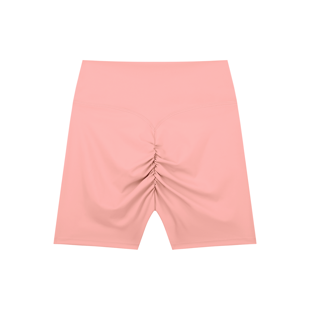 Wing Logo High-Waisted Biker Shorts in Pink, back view.