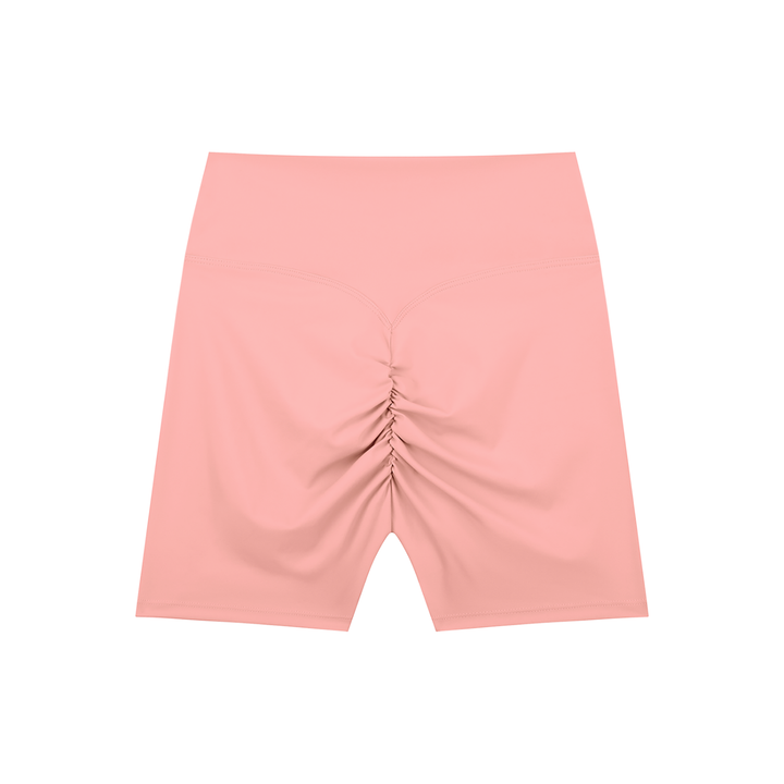 Wing Logo High-Waisted Biker Shorts in Pink, back view.
