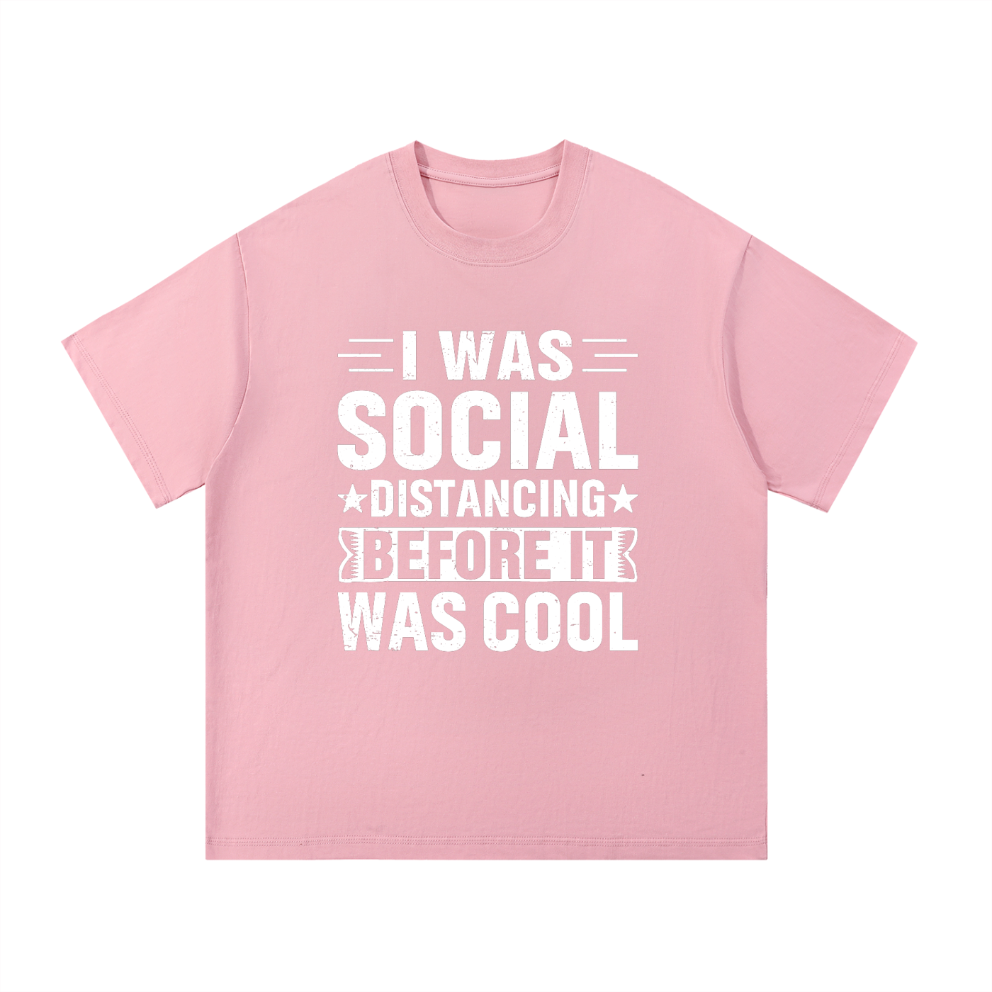 Social Distancing Before It Was Cool Funny Tee in Pink, flat lay.