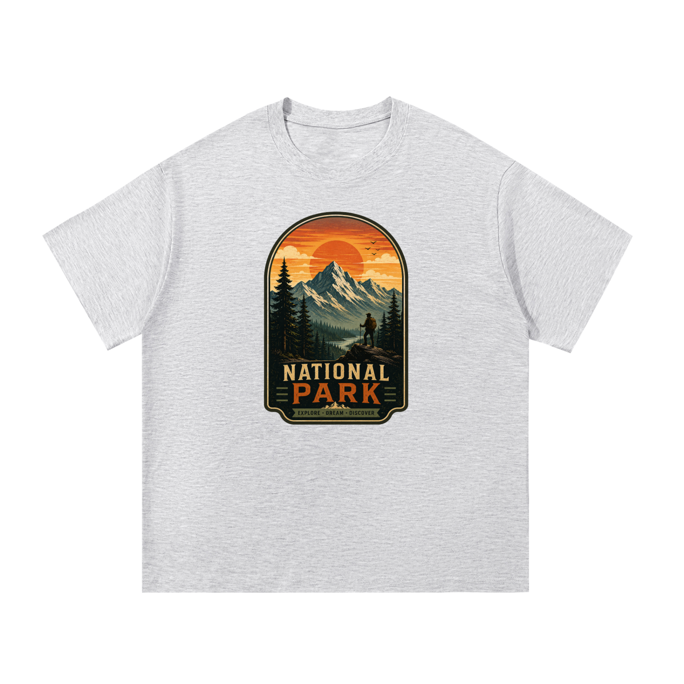 National Park Explore Dream Discover Badge Tee in White Gray, flat lay.