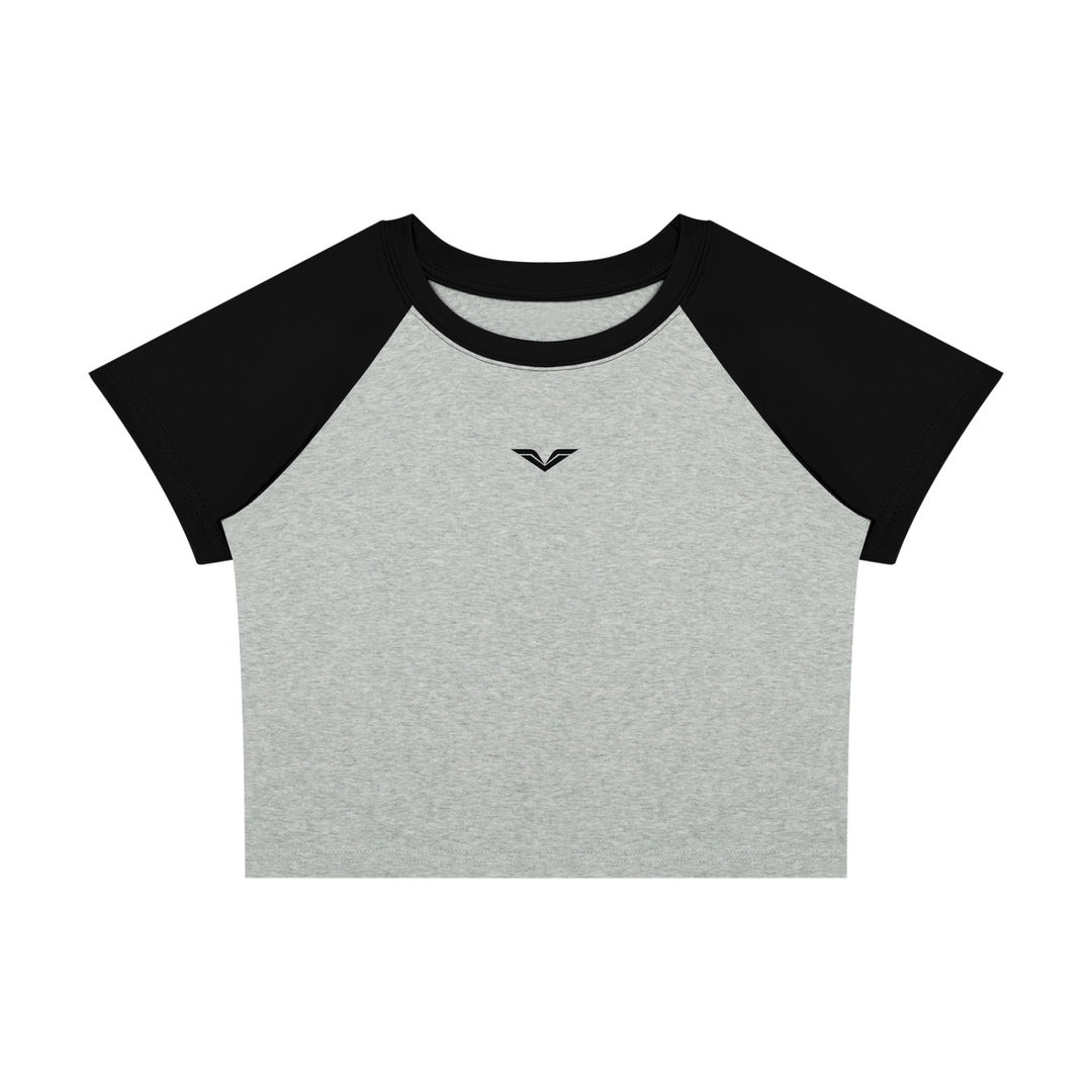 Wing Logo Raglan Colour-Block Baby Tee in Flower Gray with Black, flat lay.