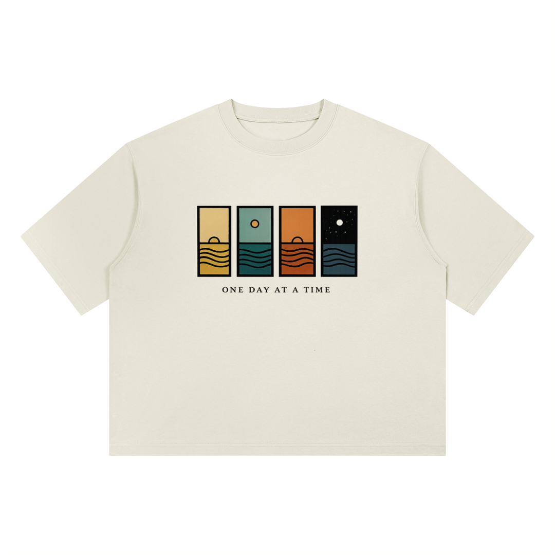 One Day At A Time Mid-Century Sunset Panel Tee in Gray, flat lay.