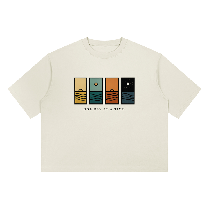 One Day At A Time Mid-Century Sunset Panel Tee in Gray, flat lay.
