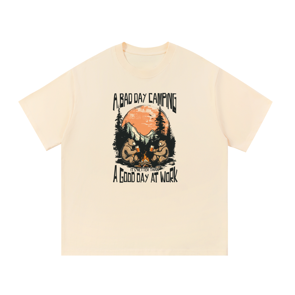 A Bad Day Camping Beats A Good Day At Work Tee in Apricot, flat lay.