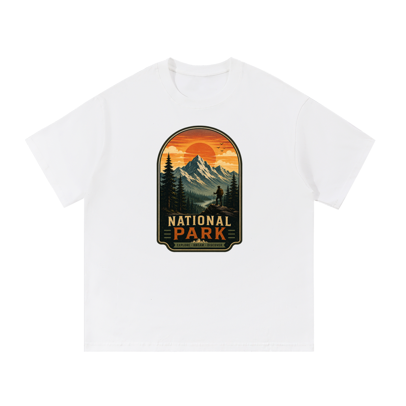 National Park Explore Dream Discover Badge Tee in White, flat lay.