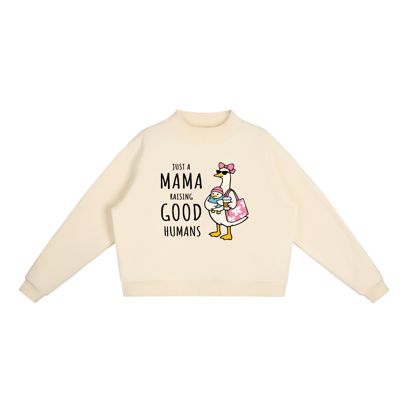 Just A Mama Raising Good Humans Goose Sweatshirt in Cream Apricot, flat lay.