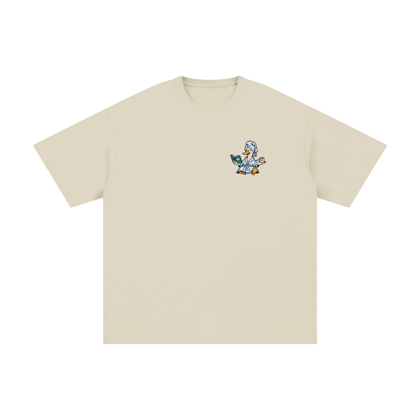 Reading Duck Left-Chest Cotton Tee in Light Apricot, flat lay.
