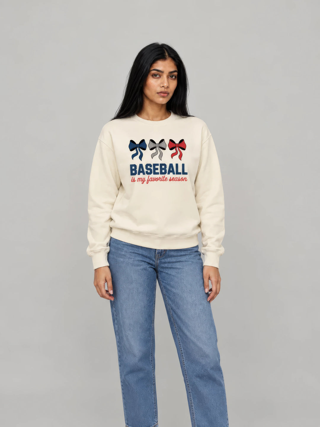 Model in a cream Baseball Is My Favourite Season bow sweatshirt